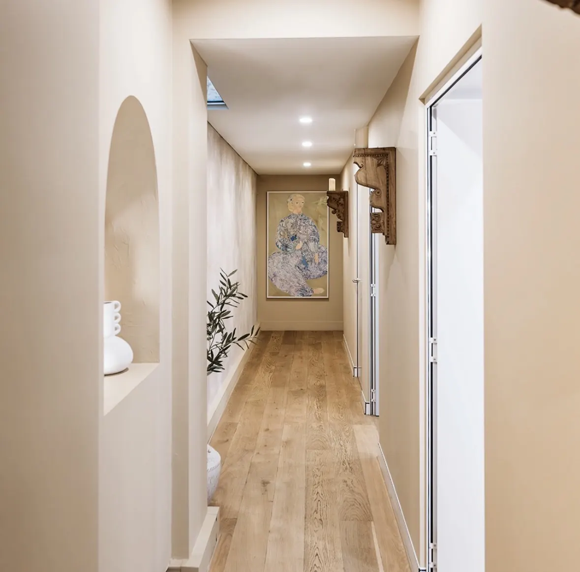 The arched hallway inside Jade Walker & Co